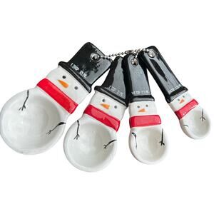 Set of four ceramic measuring spoons shaped like Snowman Christmas holiday